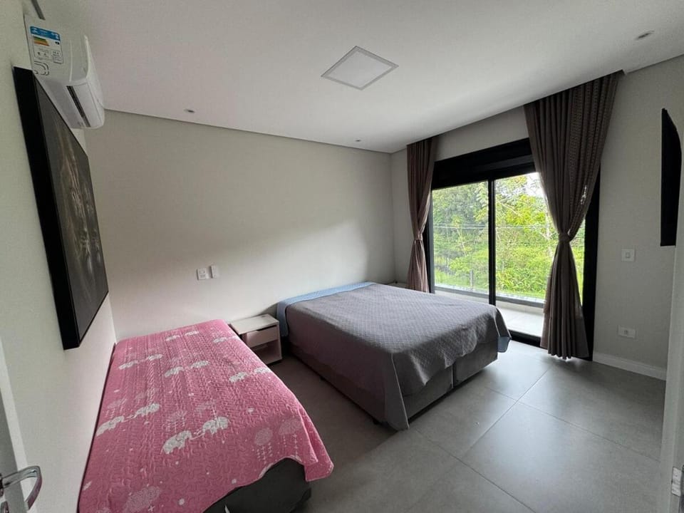 Casa Espaçosa no Condomínio Morada da Praia House in Bertioga