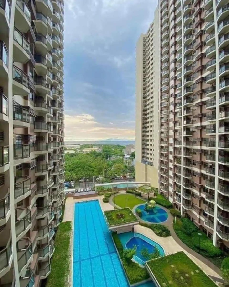 Property building, Day, Natural landscape, City view, Pool view, Swimming pool