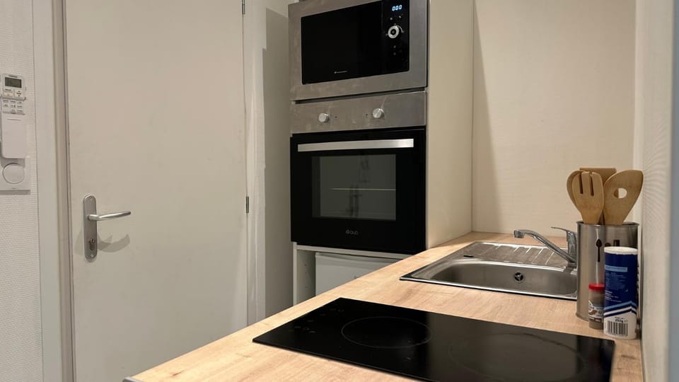 Kitchen or kitchenette, stove