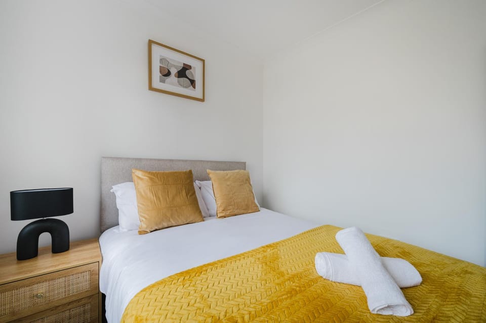 Bed, towels, wardrobe