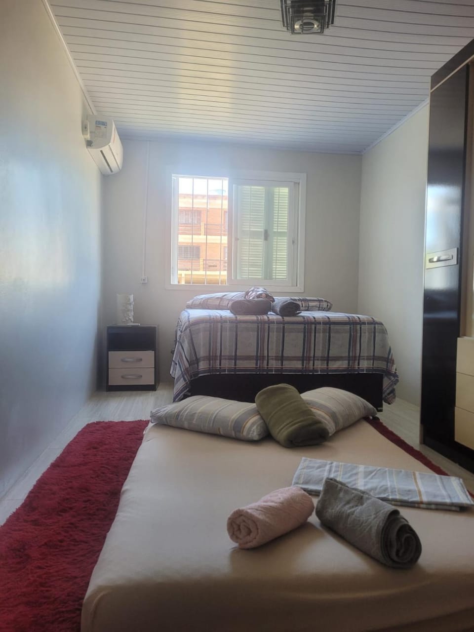 Bed, Photo of the whole room, Bedroom, towels, air conditioner
