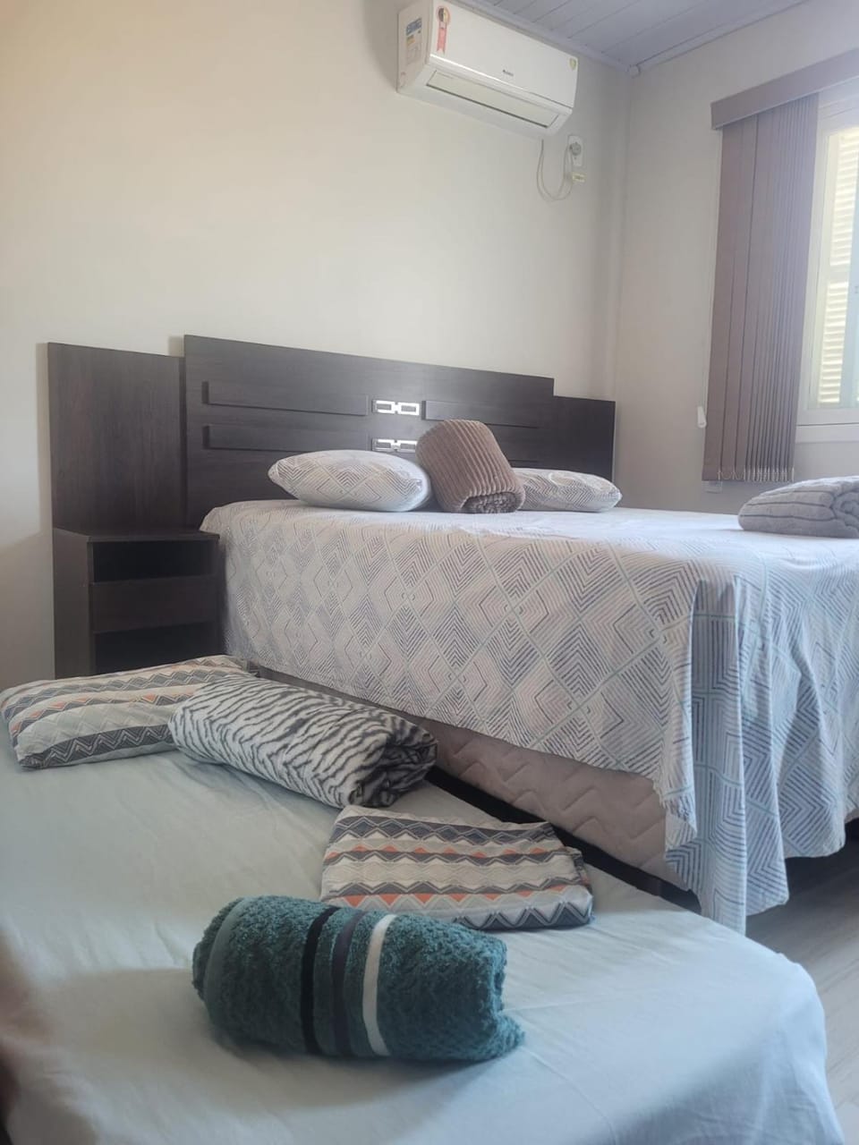Bed, Photo of the whole room, Bedroom, towels, air conditioner
