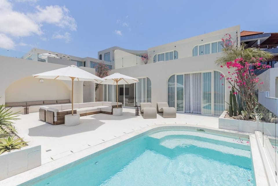 Property building, Patio, Pool view, Swimming pool, sunbed