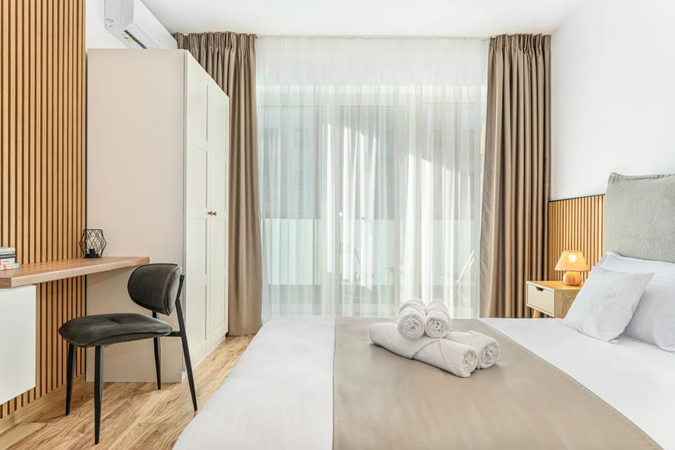 Photo of the whole room, Bedroom, towels, air conditioner