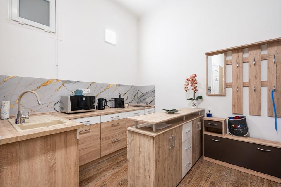 Kitchen or kitchenette, stove, toaster