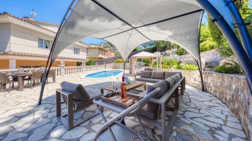 Property building, Living room, Swimming pool