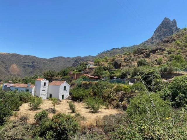 Property building, Natural landscape, Mountain view