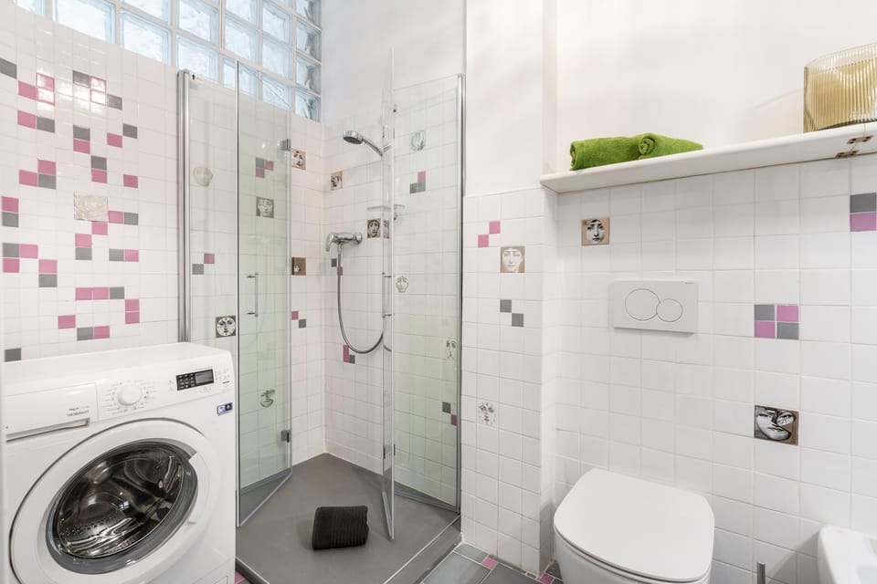 Shower, Toilet, Bathroom, towels, washing machine, dryer