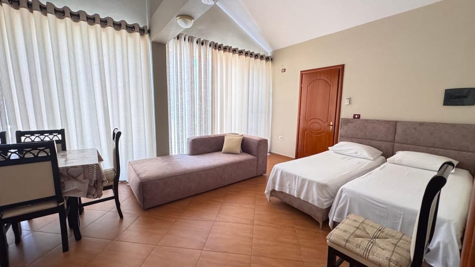 Bed, Living room, Seating area