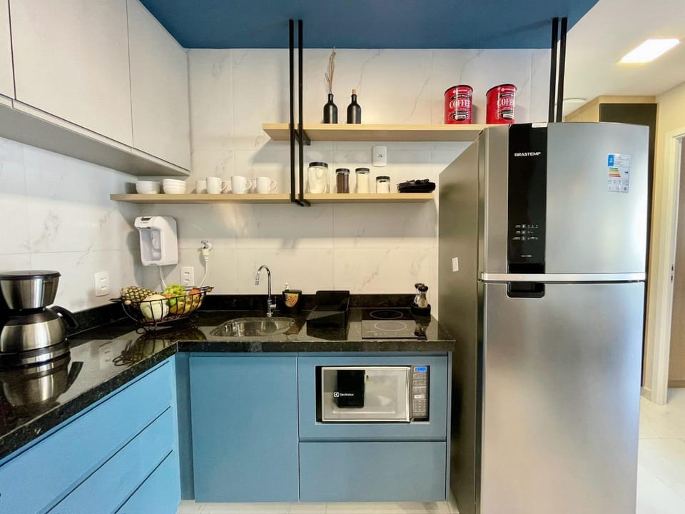 microwave, minibar, stove, toaster