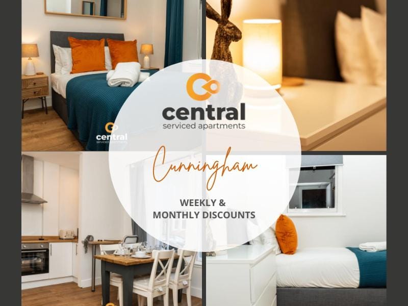 Bed, Property logo or sign, Kitchen or kitchenette, Living room, Food and drinks, Photo of the whole room, Seating area, Dining area, Logo/Certificate/Sign, Bedroom, Food, Text overlay, Certificate/Award, minibar