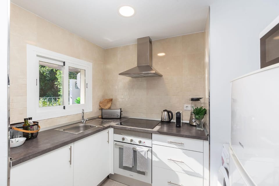 Kitchen or kitchenette, oven, stove, toaster