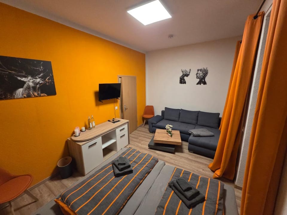 Communal lounge/ TV room, Bed, Bedroom