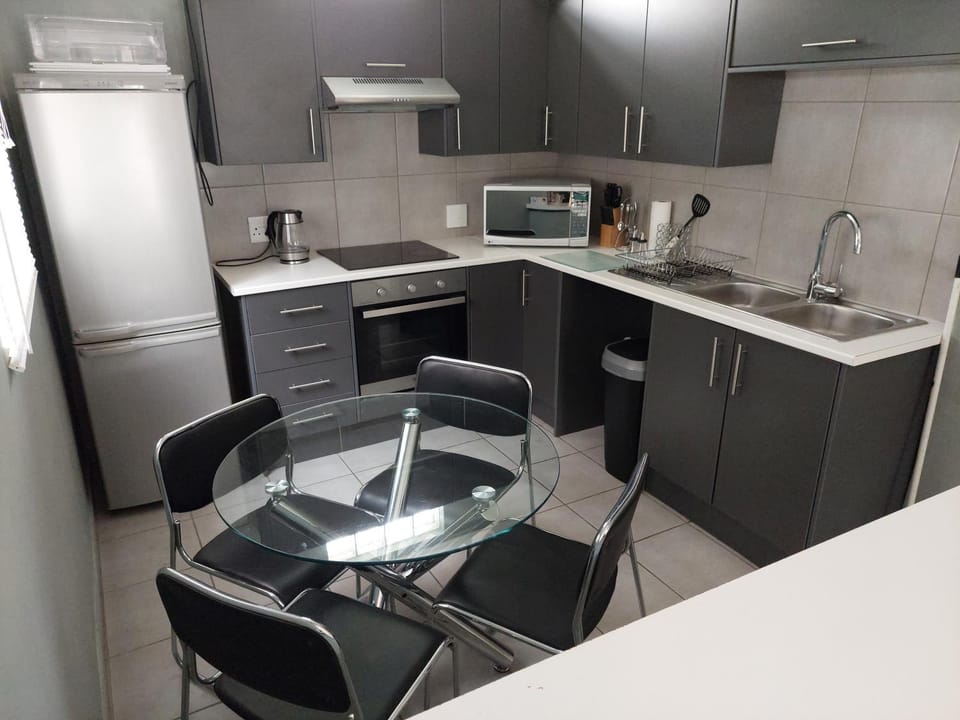 Kitchen or kitchenette, oven, stove