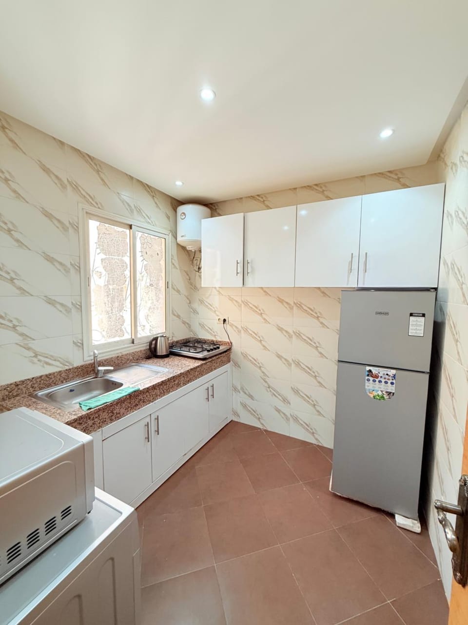 Kitchen or kitchenette, stove