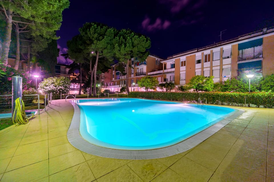 Property building, Night, Pool view, Swimming pool, sunbed