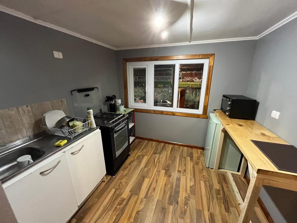 Kitchen or kitchenette, oven