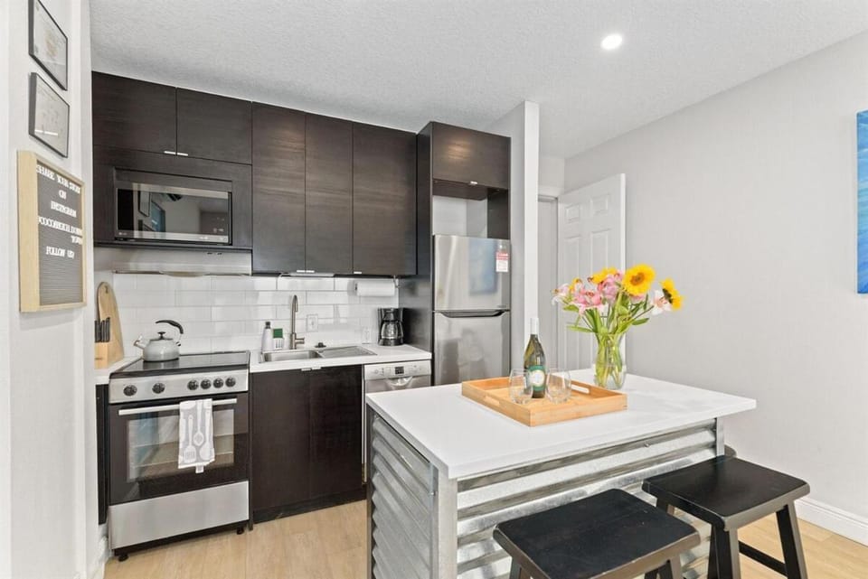 Kitchen or kitchenette, dishwasher, oven, stove, toaster