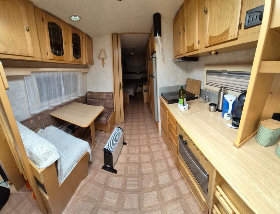 Photo of the whole room, stove