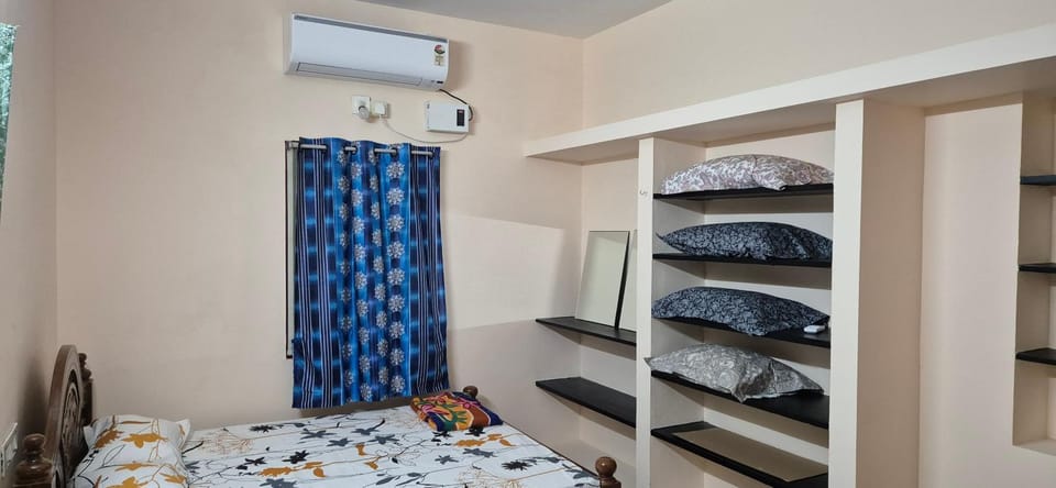 Bed, wardrobe, air conditioner