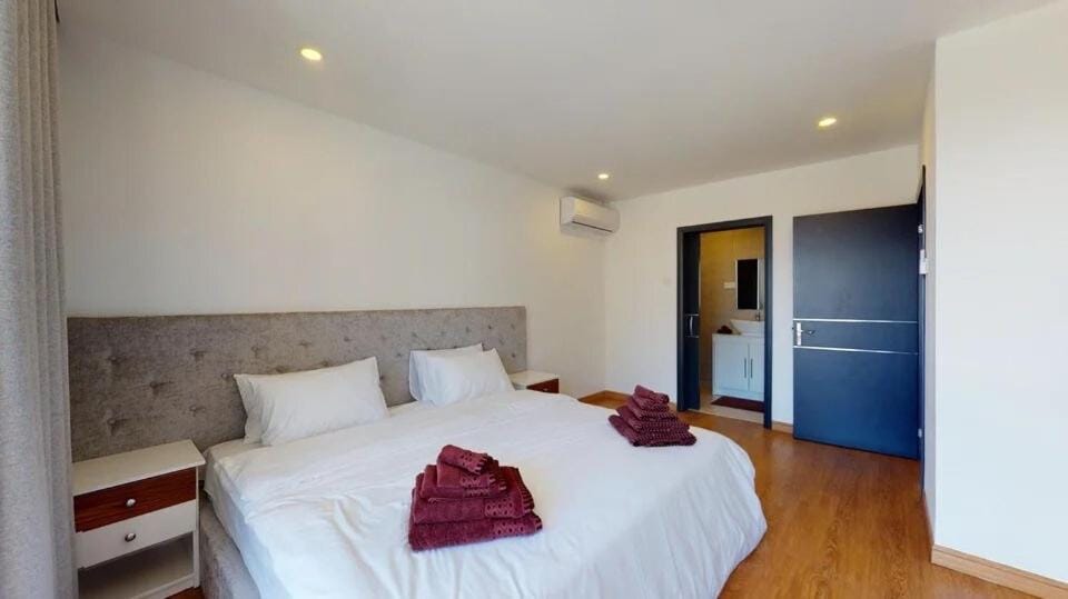 Bed, Photo of the whole room, Bedroom, towels, air conditioner