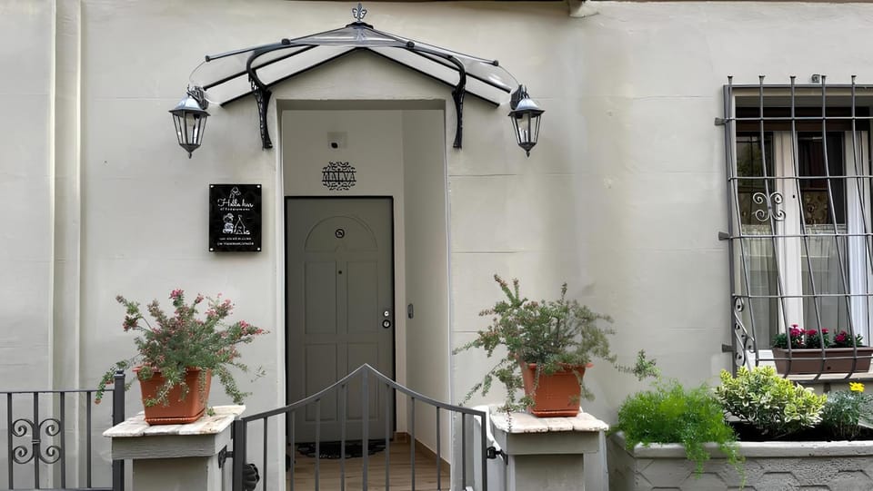 Property building, Patio, Facade/entrance, Property logo or sign, Logo/Certificate/Sign, Landmark view, Location