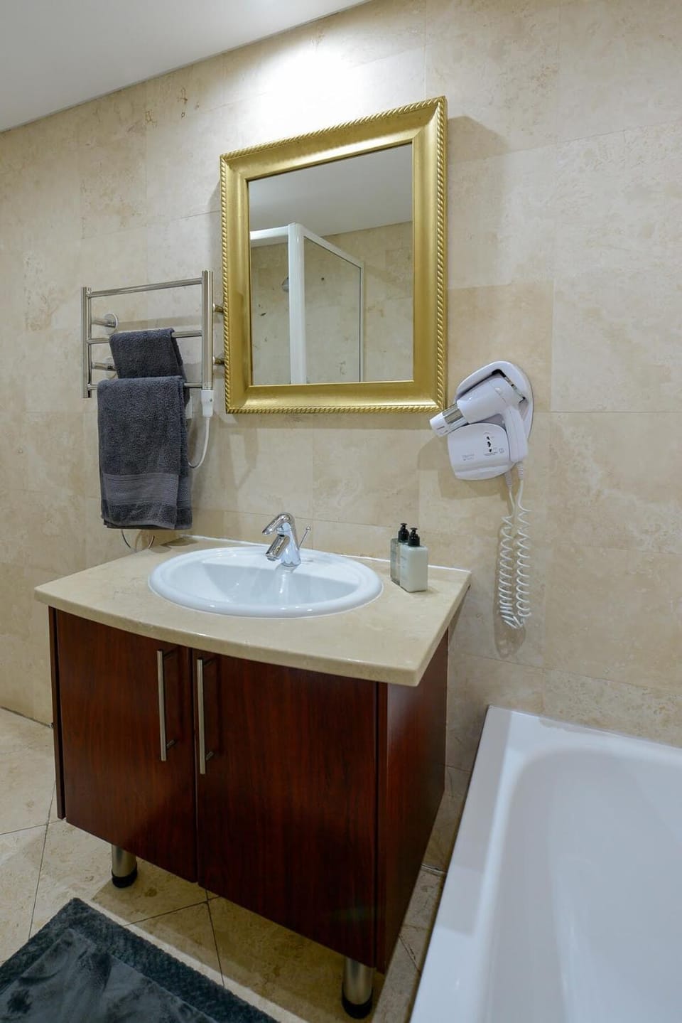 Bathroom, hair dryier, towels