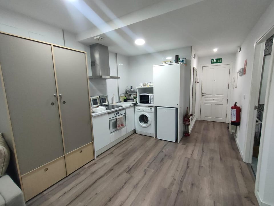 Kitchen or kitchenette, washing machine