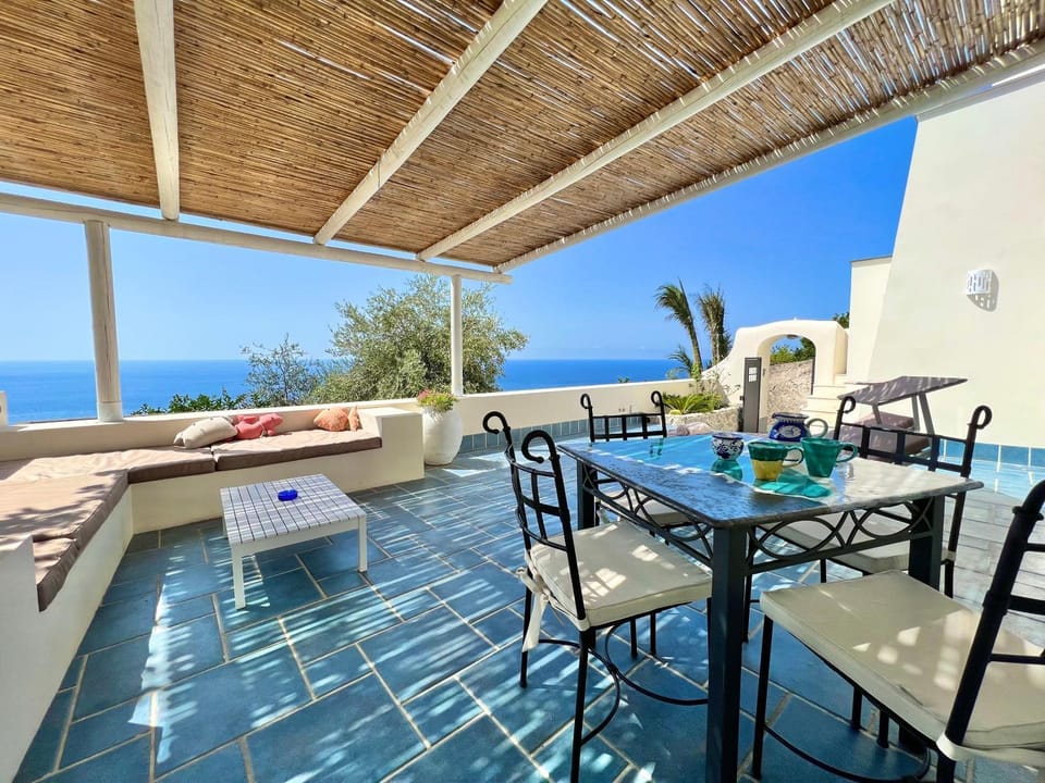 Patio, Natural landscape, View (from property/room), Balcony/Terrace, Living room, Seating area, Dining area, Sea view, sunbed