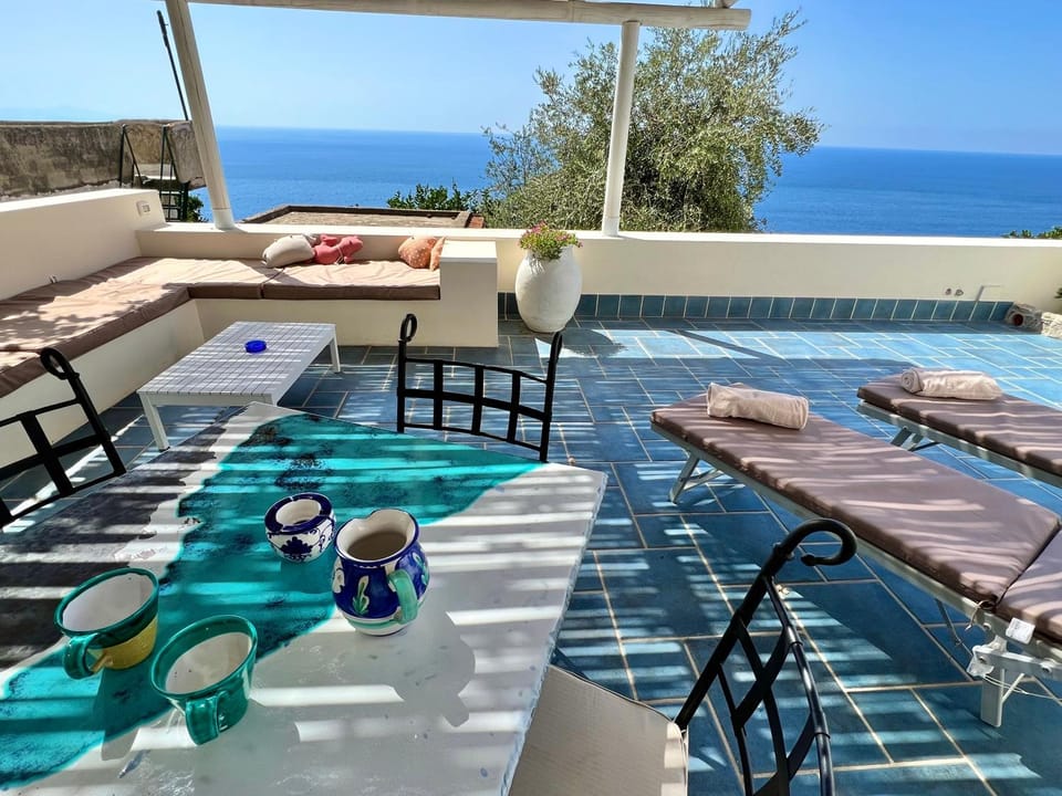 Patio, Day, Natural landscape, View (from property/room), Balcony/Terrace, Living room, Seating area, Dining area, Sea view, sunbed