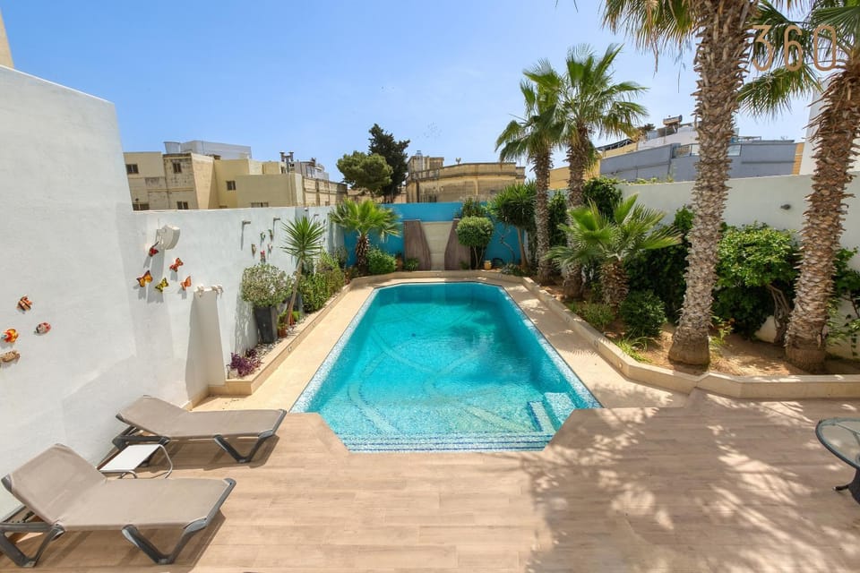 Patio, Day, Natural landscape, Pool view, Swimming pool, sunbed