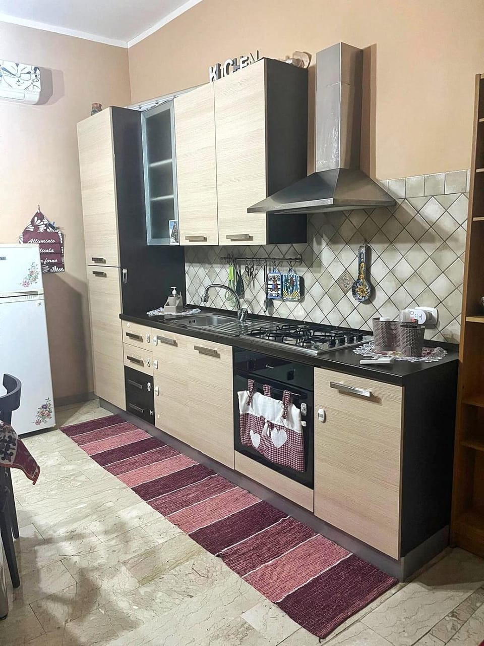 Kitchen or kitchenette, oven, stove