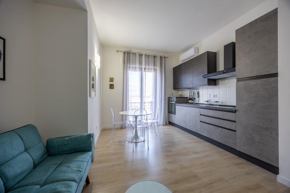 Living room, Seating area, Dining area, oven, stove, air conditioner