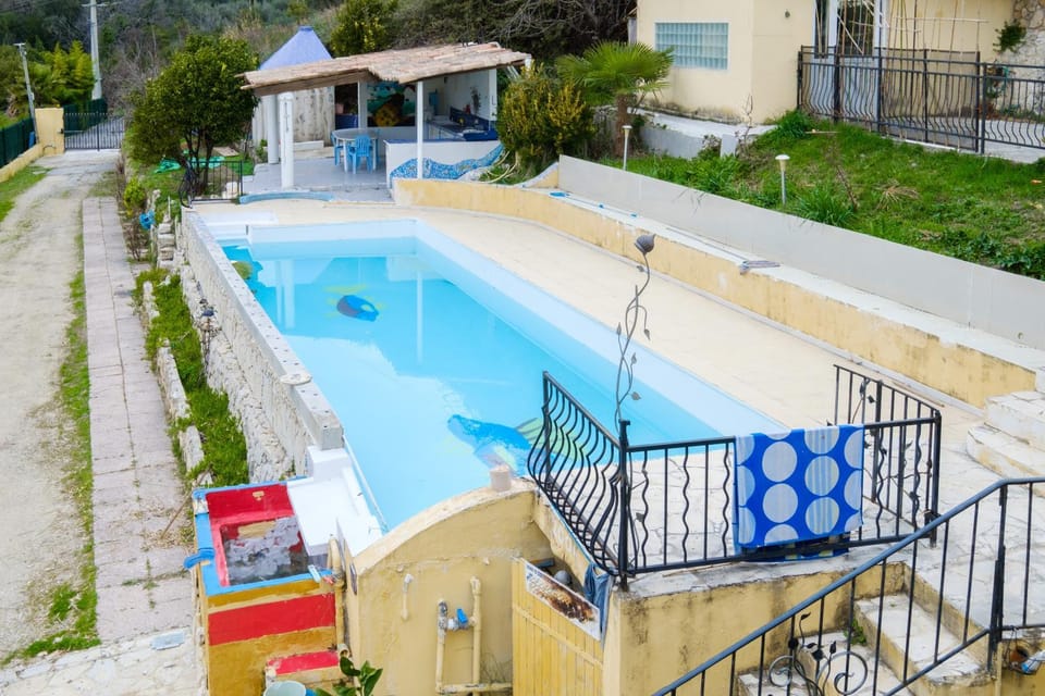 Property building, Living room, Swimming pool