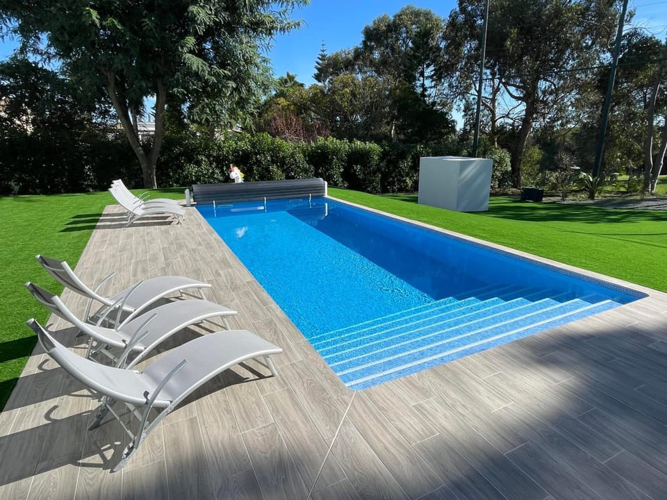 Property building, Living room, Swimming pool