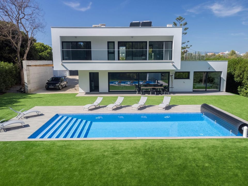Property building, Living room, Swimming pool