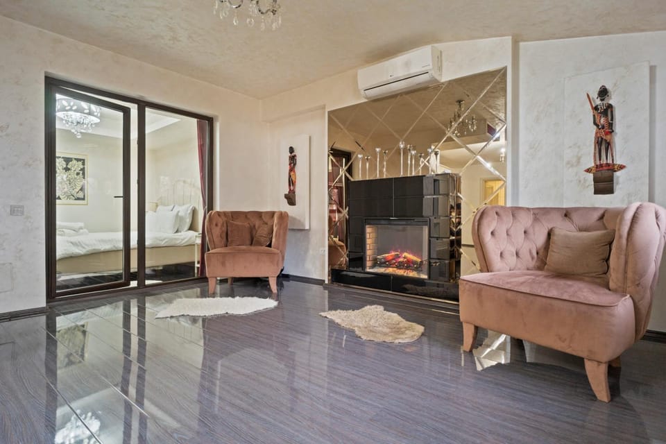 Living room, Seating area, fireplace, air conditioner