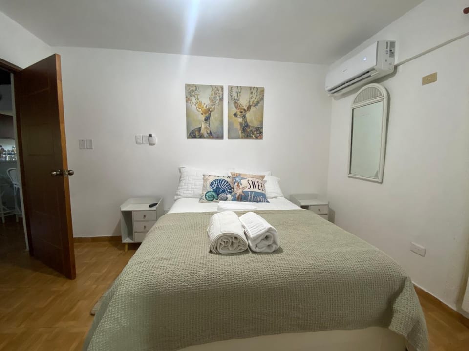 Bed, Photo of the whole room, Bedroom, towels, air conditioner