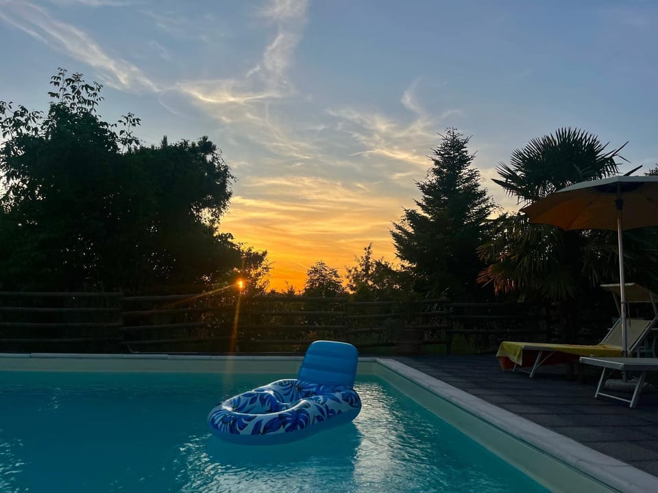 Day, Natural landscape, Pool view, Swimming pool, Swimming pool, Sunset, sunbed