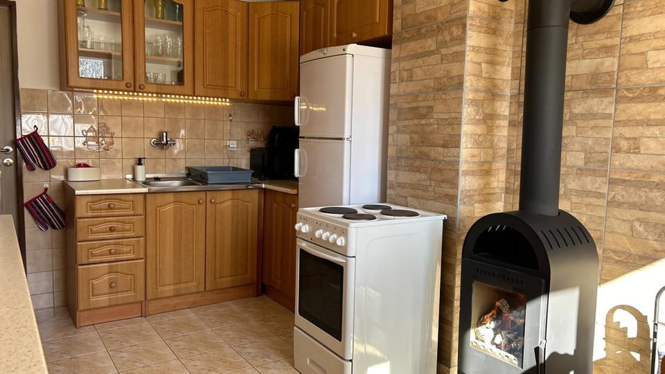 Kitchen or kitchenette, dishwasher, oven, stove, toaster