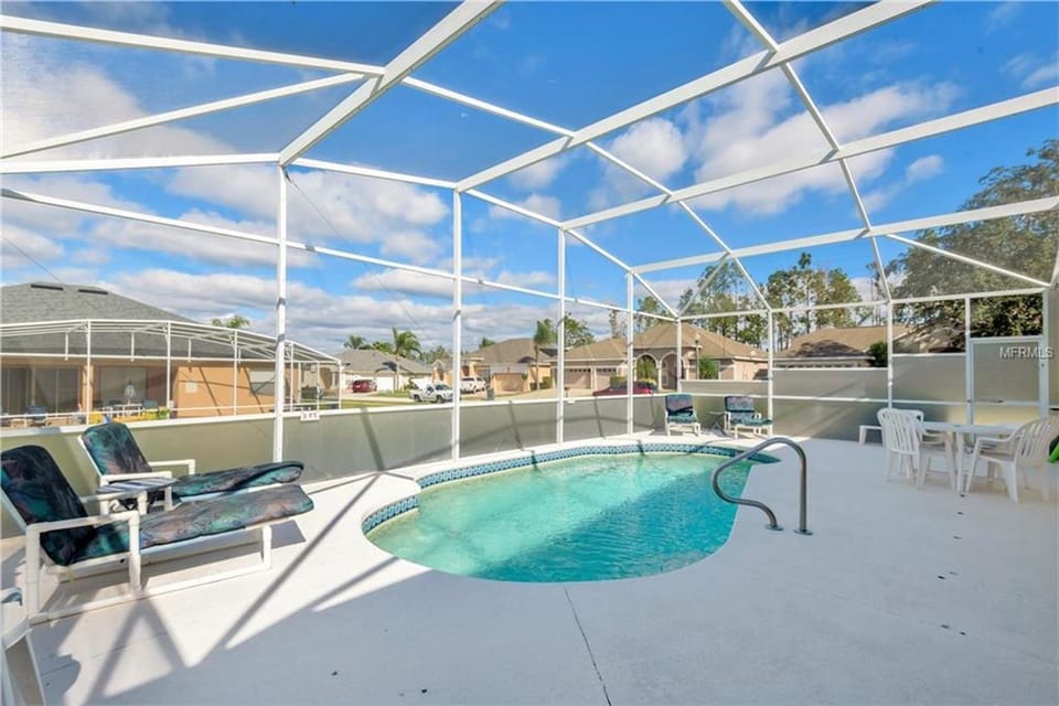 Patio, Day, Natural landscape, Pool view, Swimming pool, sunbed