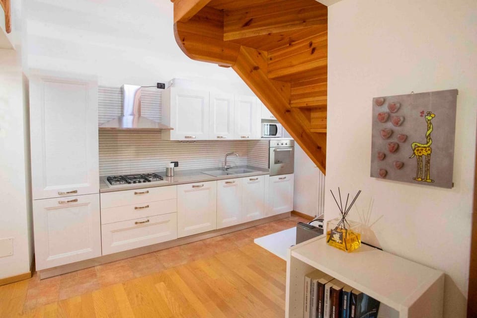 Kitchen or kitchenette, dishwasher, stove