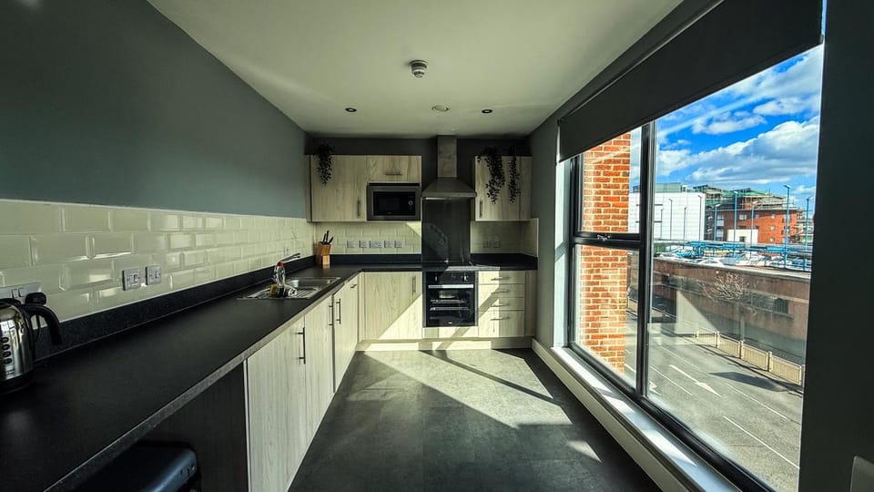 microwave, oven, stove, washing machine, kitchen