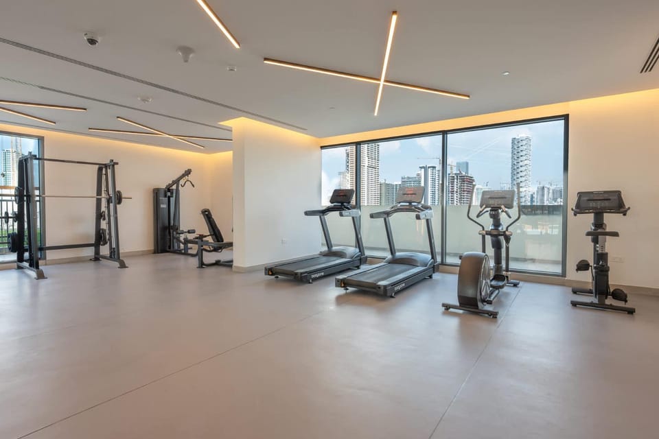 Free housekeeping visits during your stay - StayShort - Sleek Studio in Jumeirah Village Triangle Apartment in Dubai