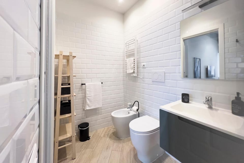Shower, Bathroom, bidet, hair dryier, towels