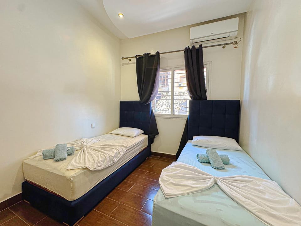 Bed, Photo of the whole room, Bedroom, towels, air conditioner