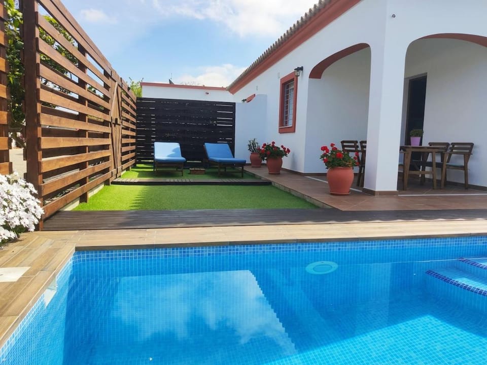 Patio, Pool view, sunbed