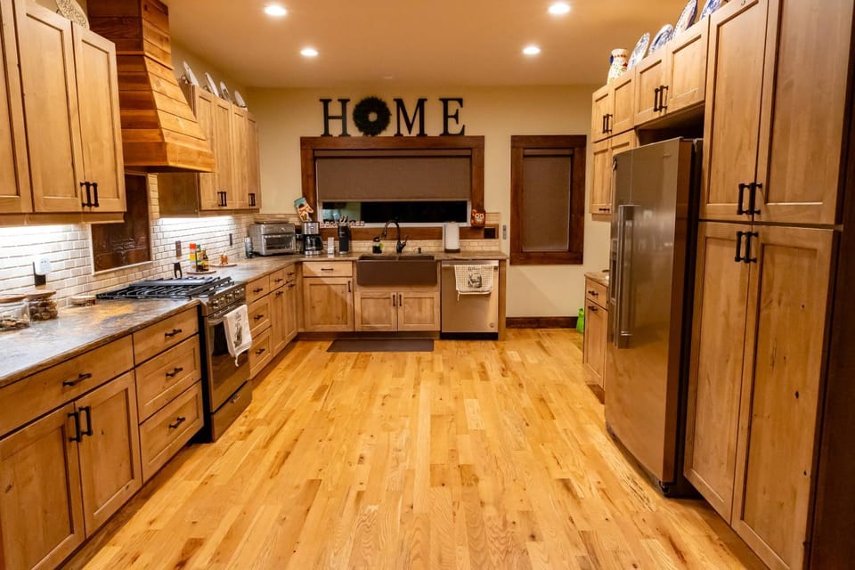 Kitchen or kitchenette, dishwasher, oven, stove, toaster