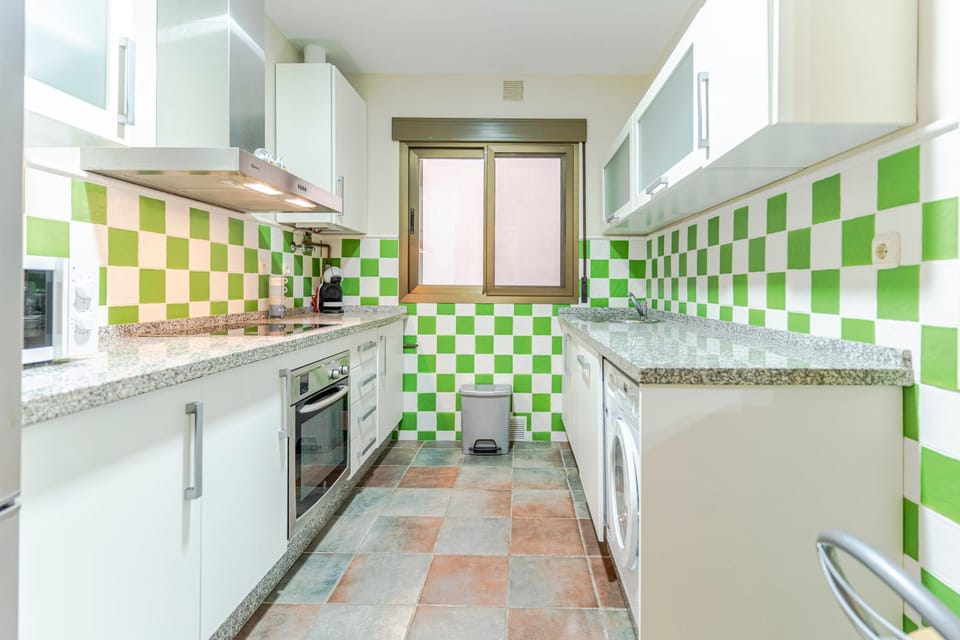 Kitchen or kitchenette, dishwasher, oven, stove, toaster
