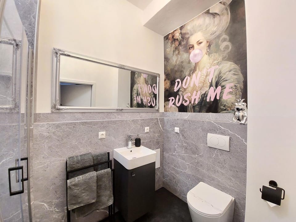 Toilet, Bathroom, hair dryier, towels, towels